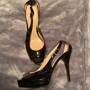 Ladies stiletto black platform heels.